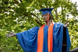 Alma Mater with a cap and gown.